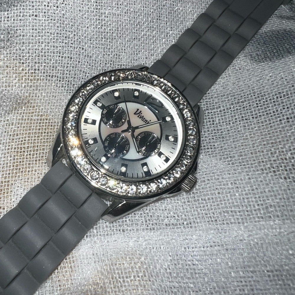 Silver, bejeweled Vivani watch with gray silicone band